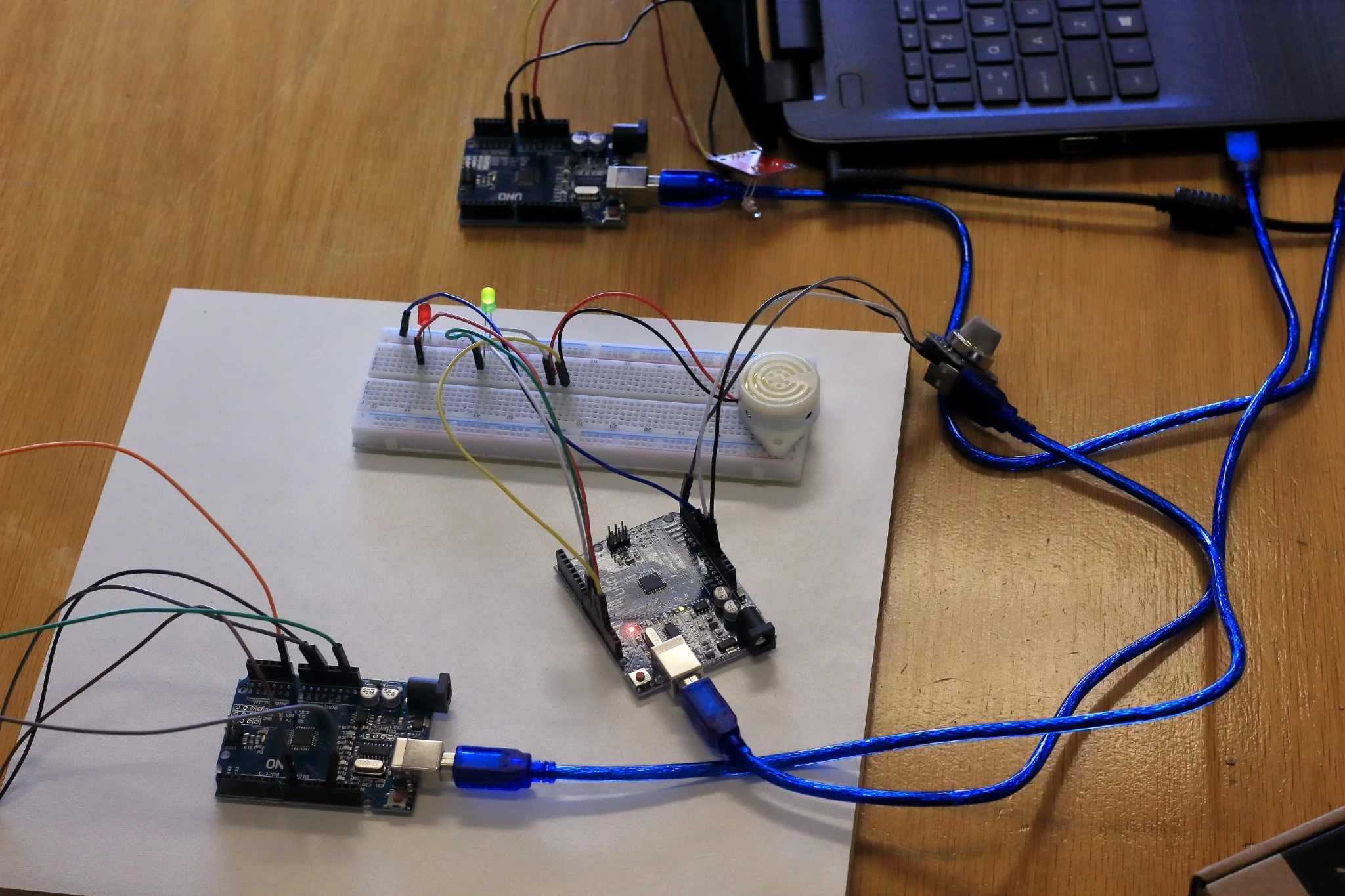 Breadboard and connected electronic components on a work surface
